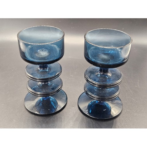 248 - A pair of Sheringham blue Wedgwood two disk glass candlesticks 5 inches tall - no obvious signs of d... 