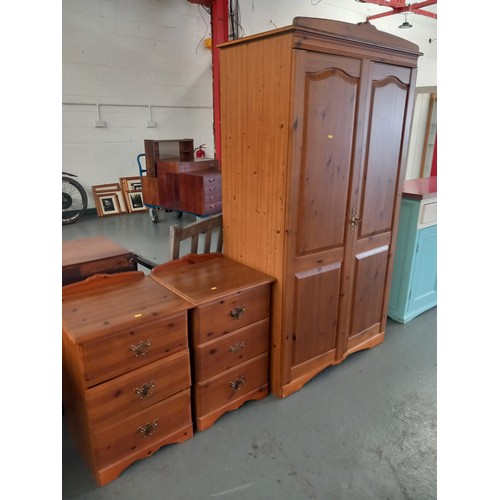 128 - A pine wardrobe with two bedside cabinets

Wardrobe 
Height 187cm
Width 96cm
Depth 52cm