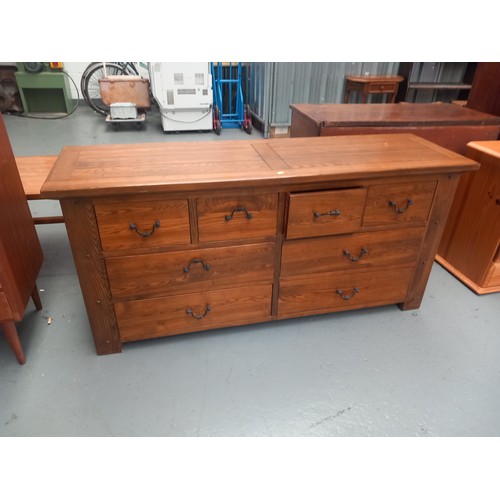 133 - A hardwood four over four chest of drawers

Height 75cm
Width 160cm
Depth 48cm