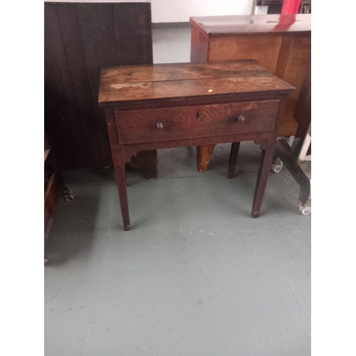 138 - An early oak lowboy