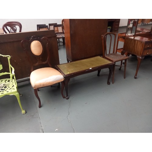 141 - An upholstered chair, coffee table and one other chair