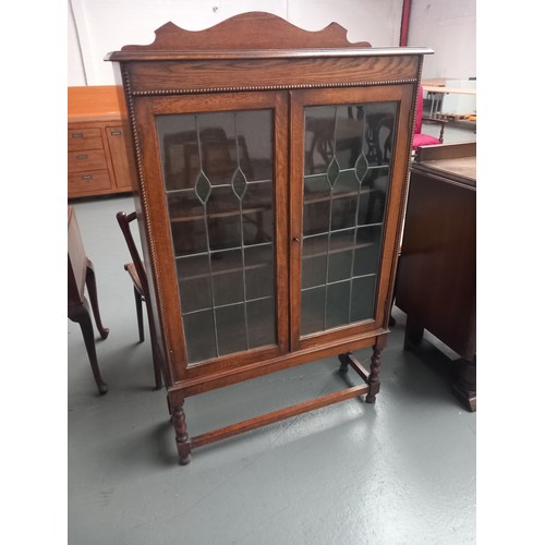 145 - An oak glass fronted bookcase

Height 150cm
Width 92cm
Depth 30cm