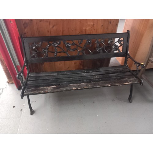 158 - A garden bench with cast iron ends