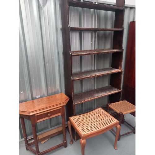 162 - A waterfall bookcase, oak hall table and two footstools