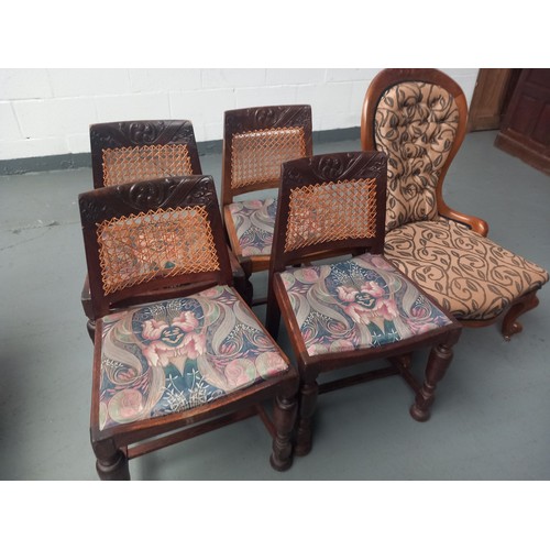 164 - Four oak framed caned back dining chairs together with a nursing chair