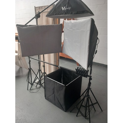 166 - A selection of photographic lighting, light box and back drops