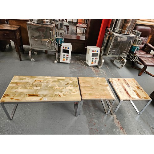 115 - Three chrome based marble top coffee tables