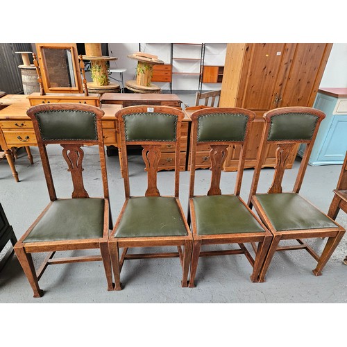 123 - Four oak framed Arts and Crafts leatherette seated dining chairs