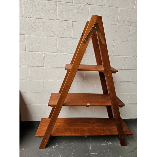 172 - A pine three tier shelving unit