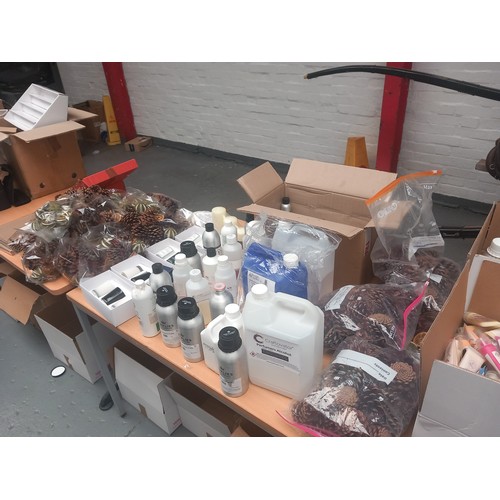 52 - A large quantity of items from the clearance of a candle making business to include bottles, melting... 