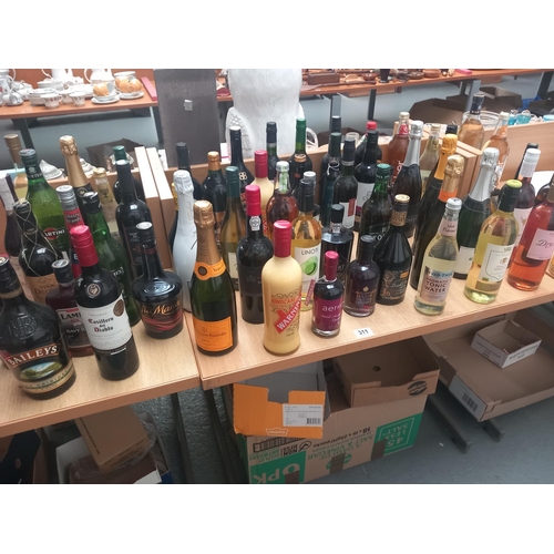 311 - A selection of alcohol to include rum, port, liqueurs, red and white wine etc