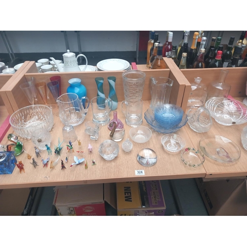 324 - A collection of glassware to include Dartington, crystal bowls, Murano duck etc