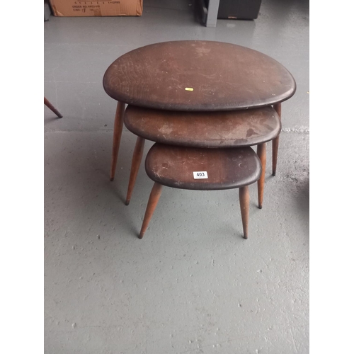 403 - An Ercol pebble nest of tables