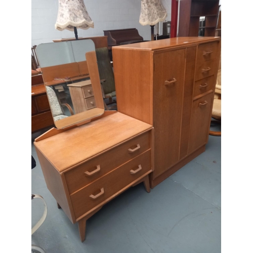 416 - A G Plan bedroom compactum and dressing table

Height 122cm
Width 88cm
Depth 45cm

Dressing table

H... 