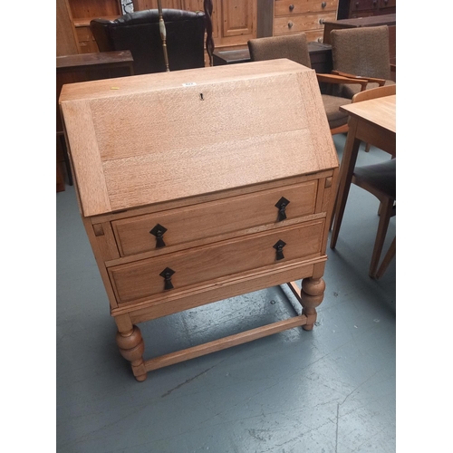 422 - An oak writing bureau

Height 98cm
Width 75cm
Depth 45cm