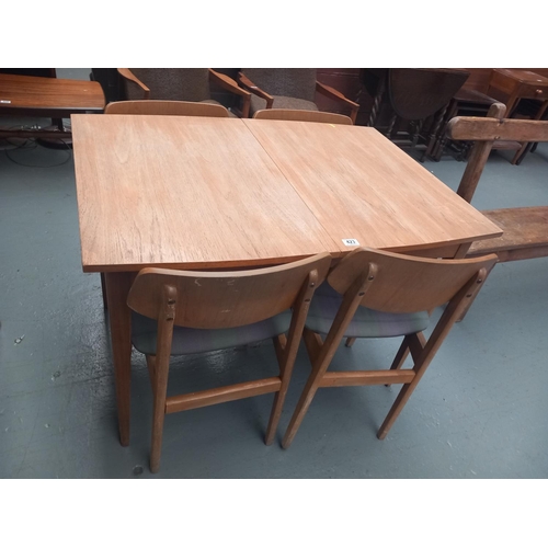 423 - An extending Lebus dining table and four chairs