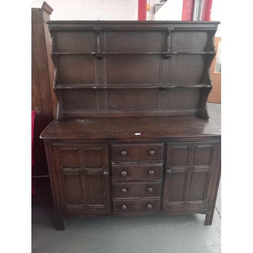 429 - An Ercol sideboard

Height 170cm
Width 145cm
Depth 52cm