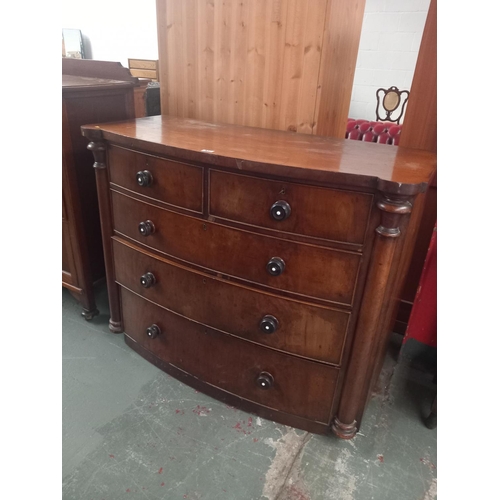 437 - A mahogany bow fronted two over three chest of drawers

Height 104cm
Width 128cm
Depth 60cm