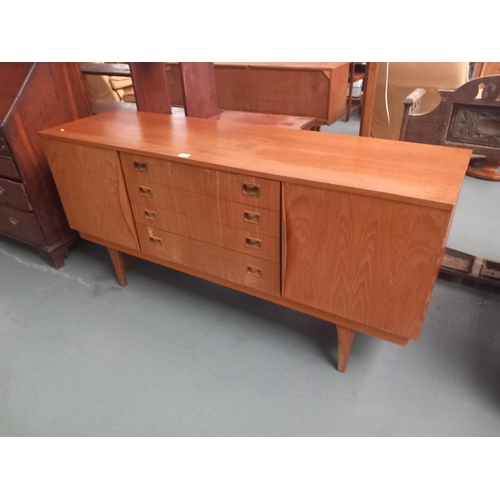 447 - A teak sideboard

Height 78cm
Width 163cm
Depth 45cm