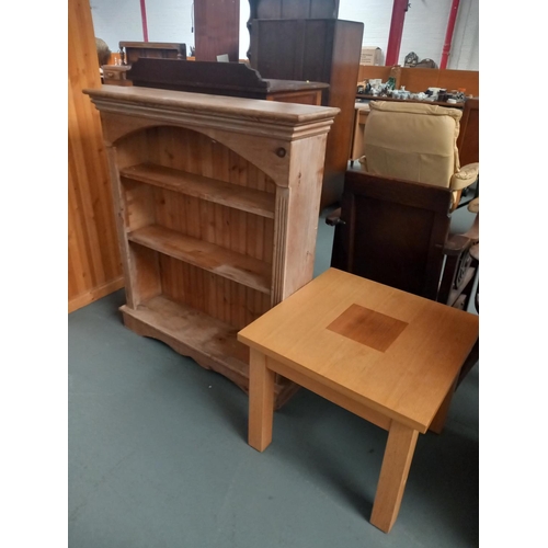 449 - A pine bookcase together with a coffee table

Bookcase
Height 114cm
Width 102cm
Depth 26cm