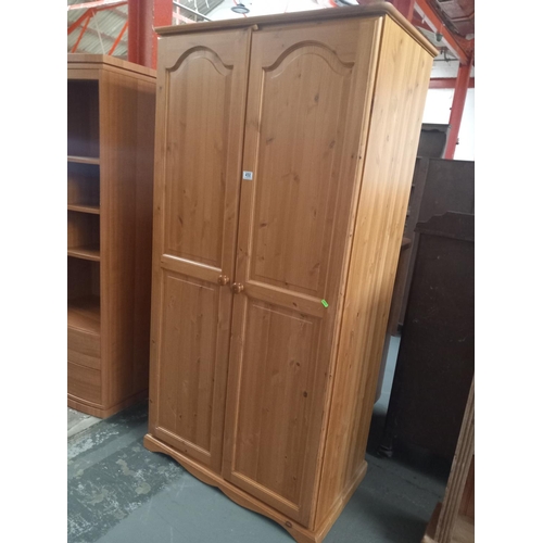 450 - A pine wardrobe

Height 180cm
Width 88cm
Depth 56cm