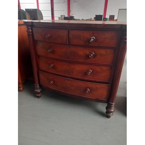 459 - A mahogany bow fronted two over three chest of drawers

Height 122cm
Width 128cm
Depth 54cm