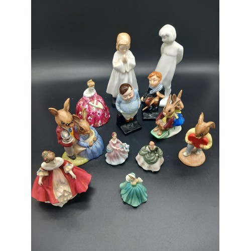 509 - A collection of small Royal Doulton figures to include Bunnykins