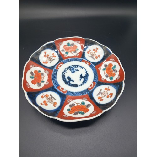 513 - A collection of early Imari plates and bowls