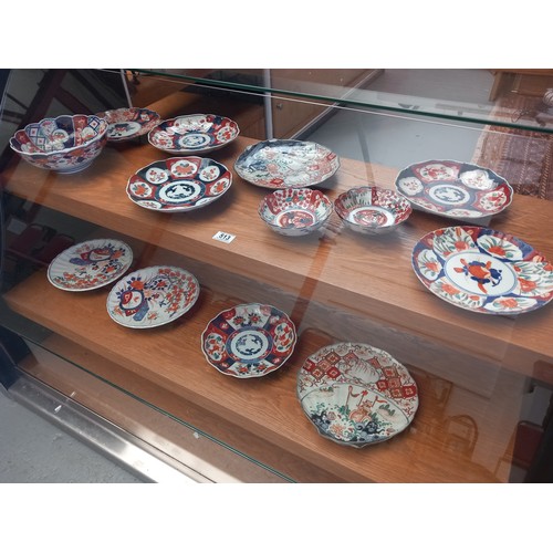 513 - A collection of early Imari plates and bowls