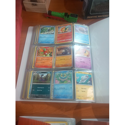 344 - Three albums of Pokémon cards - some first editions together with boxed Corgi cars, watches etc