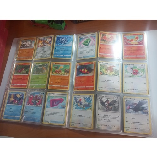 344 - Three albums of Pokémon cards - some first editions together with boxed Corgi cars, watches etc