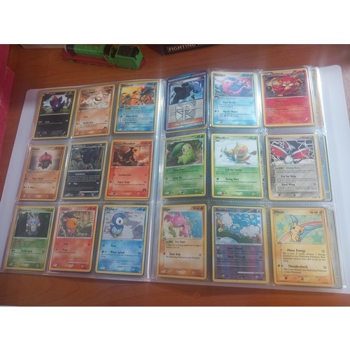 344 - Three albums of Pokémon cards - some first editions together with boxed Corgi cars, watches etc