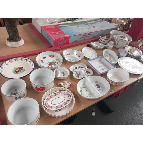 565 - A collection of Jersey pottery plates, Royal Worcester Evesham china etc