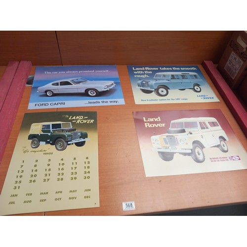 568 - Four motor advertising signs to include three Land Rover and one Ford Capri