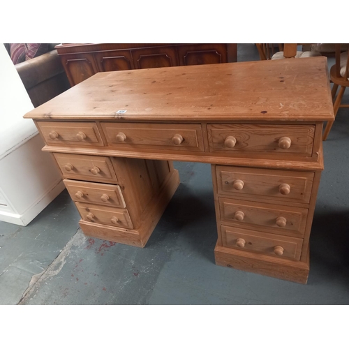 618 - A twin pedestal pine desk

Height 80cm
Width 122cm
Depth 62cm