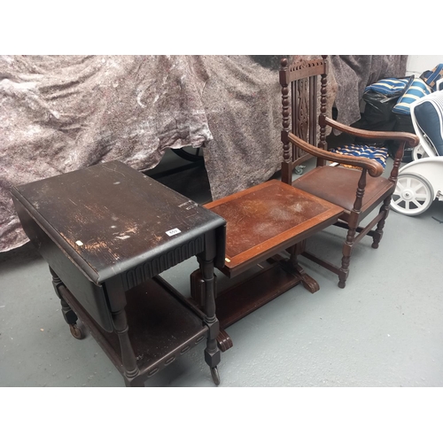 653 - An oak armchair, coffee table and a small drop leaf table