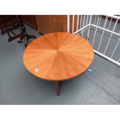 654 - A circular mid century coffee table