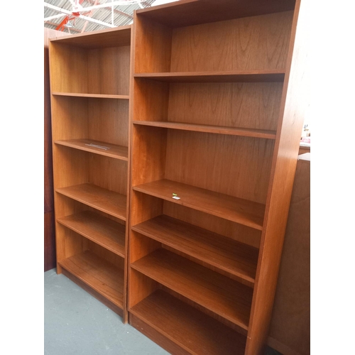 669 - Two teak bookcases