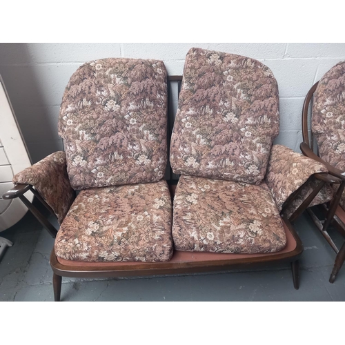 672 - An Ercol two seater sofa