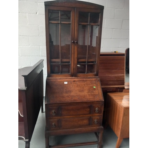 676 - An oak bureau bookcase

Height 192cm
Width 72cm
Depth 42cm