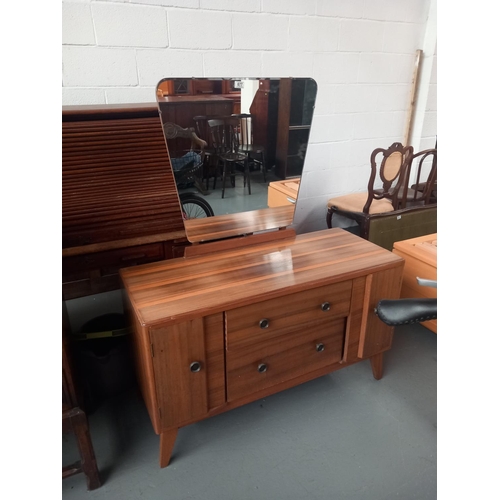 677 - A mid century dressing table

Height 140cm
Width 115cm
Depth 46cm