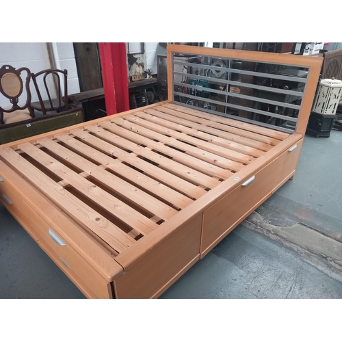 679 - A pine double bed frame