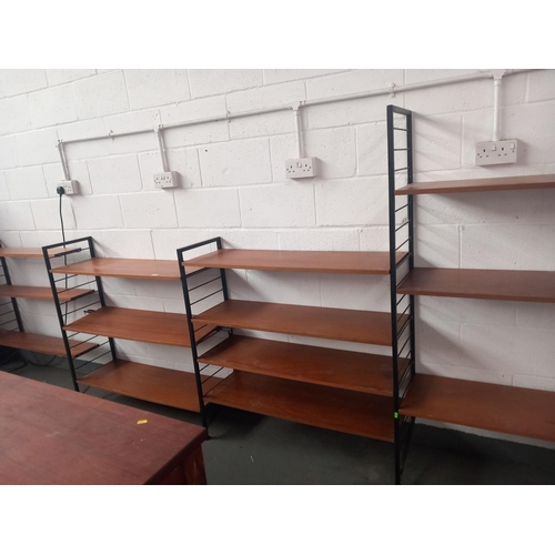 688 - A four bay Ladderax style shelving unit