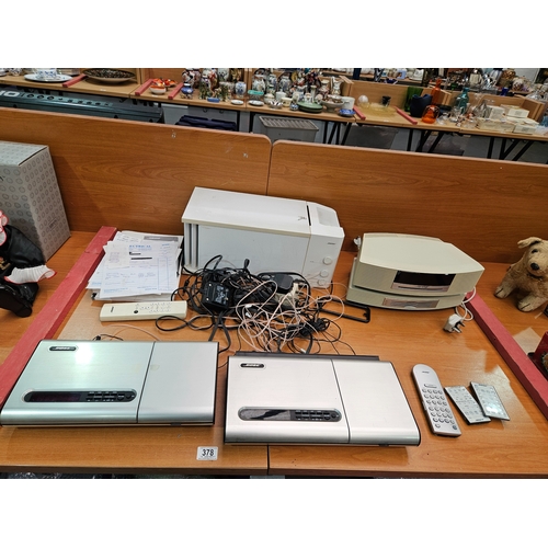 378 - Bose music equipment - with original sales receipts, instructions and remote controls