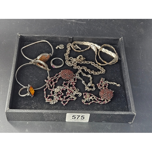 575 - A collection of silver jewellery - chains, bangles, necklace and bracelet, etc