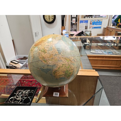 606 - A vintage Phillips 13 1/2 inch terrestrial globe on wooden base