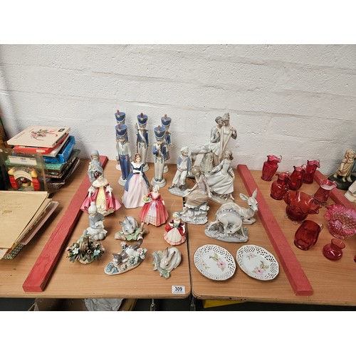 309 - A collection of Lladro, Royal Doulton, Royal Copenhagen figurines, etc