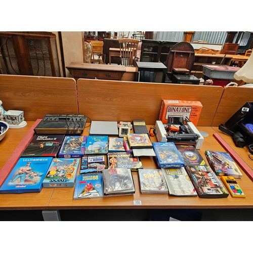 352 - An Atari video computer console, Atari games, Binatone TV Master Mk 6 console, etc