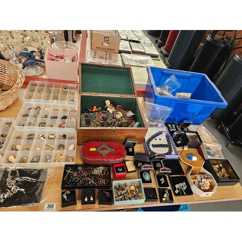 360 - A collection of costume jewellery and powder compacts