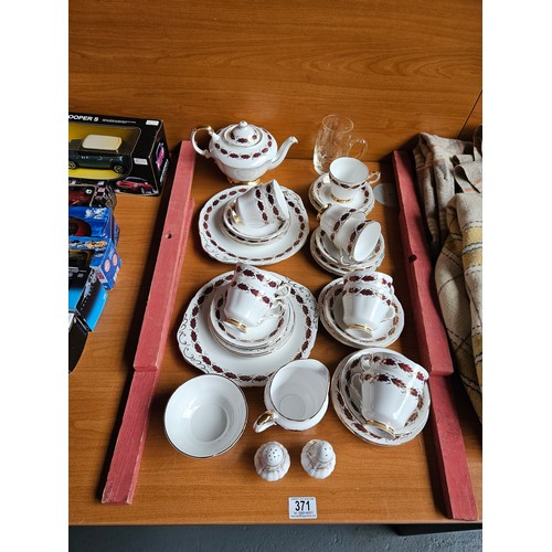 371 - A full Paragon 12 place setting tea set including tea pot (1 cup is missing)